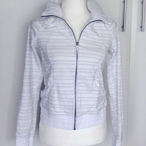 White and gray Lululemon zip up jacket.